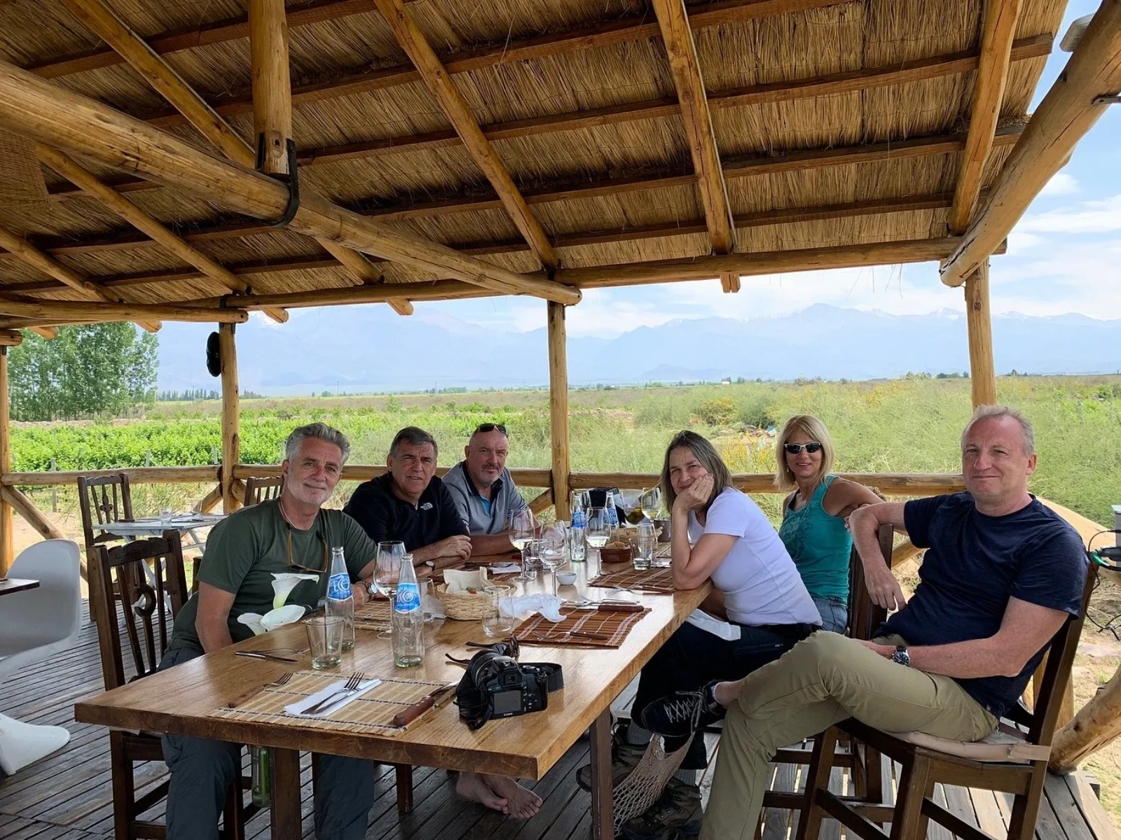 Open-air lunch under the winery pergola